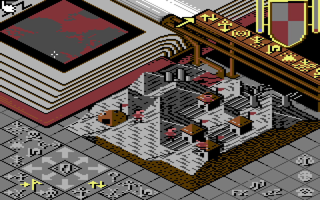 C64 Populous, lava land: a grey village with red lava pools and rocks, reaching the edge of the book under the rail